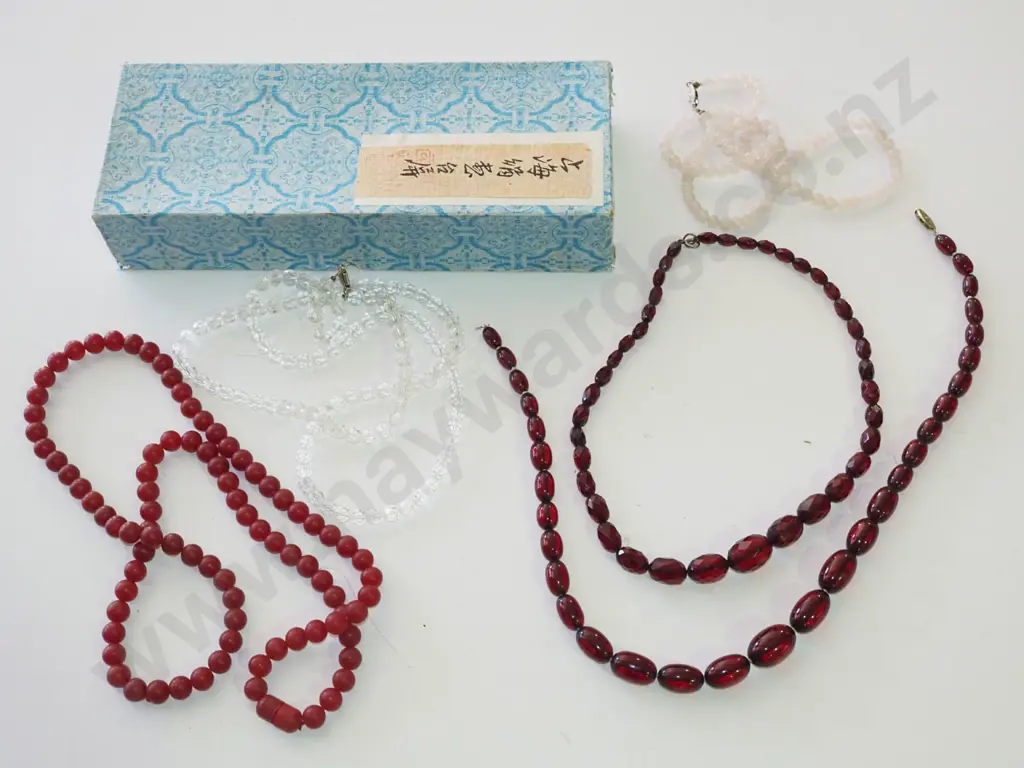 tray of glass & plastic beaded necklaces Image 1++