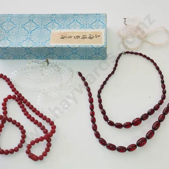 tray of glass & plastic beaded necklaces