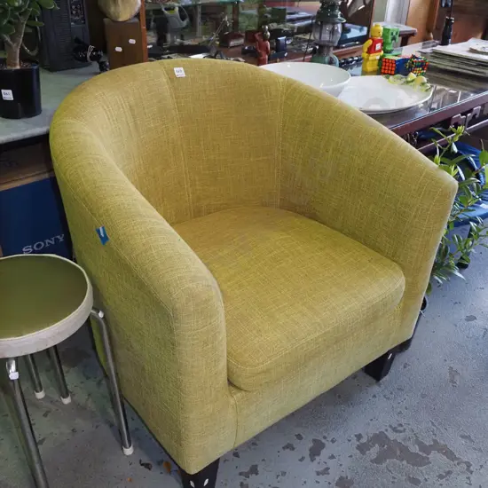 mustard upholstered tub chair