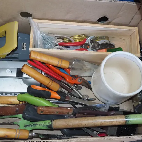 box; garden tools, hole punch, padlock etc
