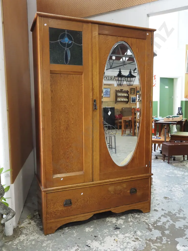 solid oak wardrobe with 1 lower drawer, 1 door with insert oval mirror, small leadlight pane H1990 W1160 D460 Image 1++