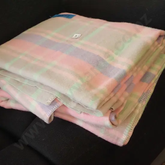 2x pink checked woollen blankets