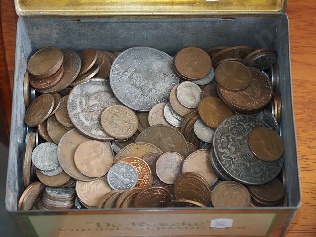 tin of various coins Image 1++