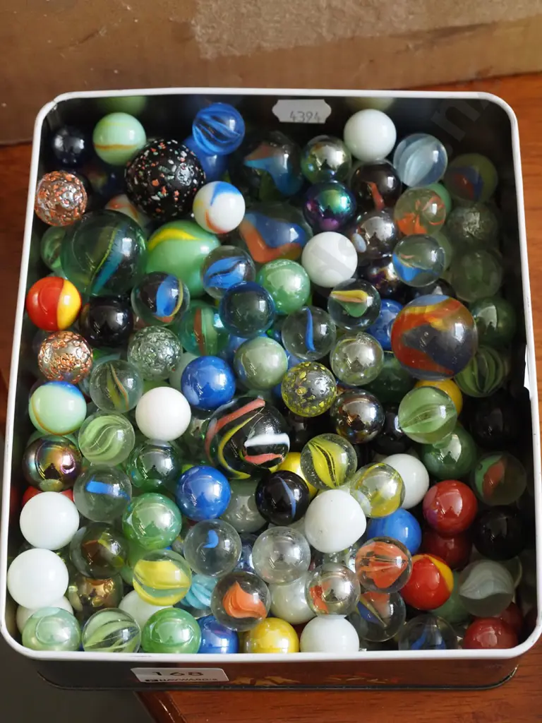 tin of marbles Image 1++