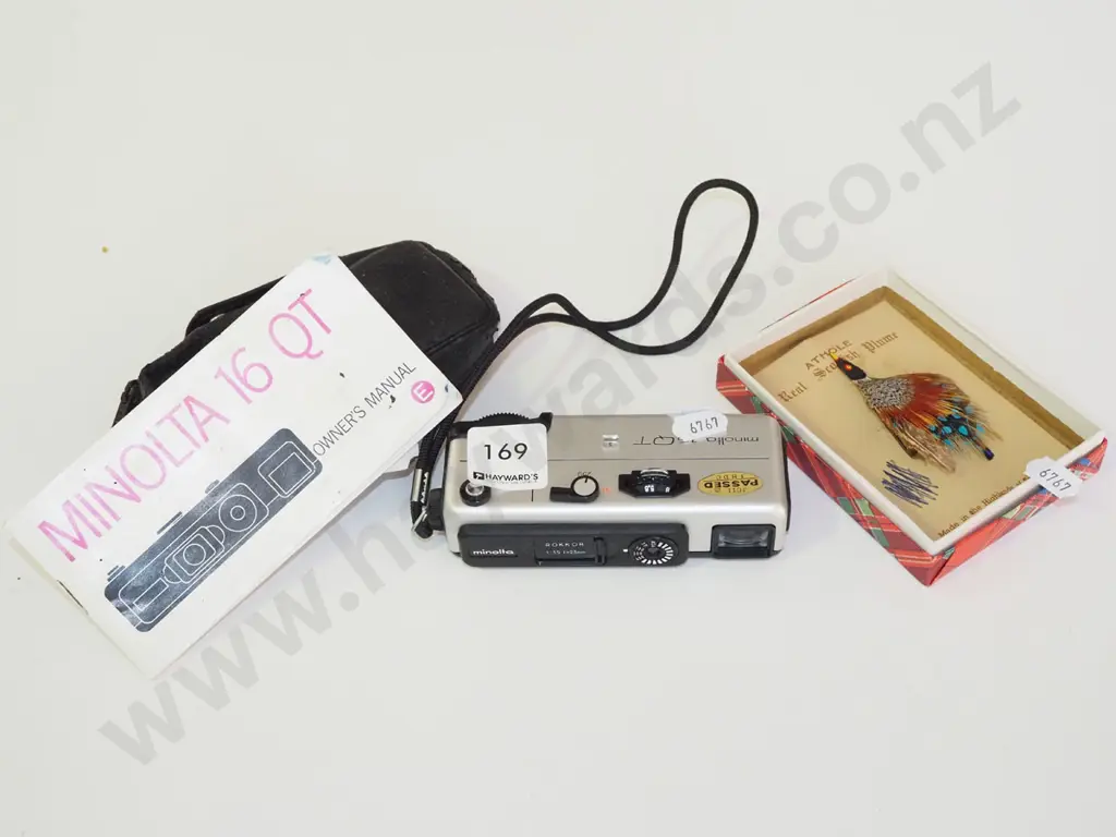 brooch, minolta 16QT film camera Image 1++