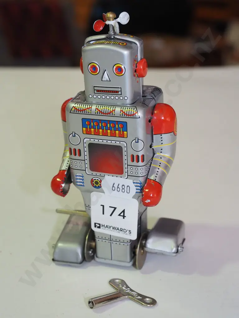 tin clock toy robot Image 1++