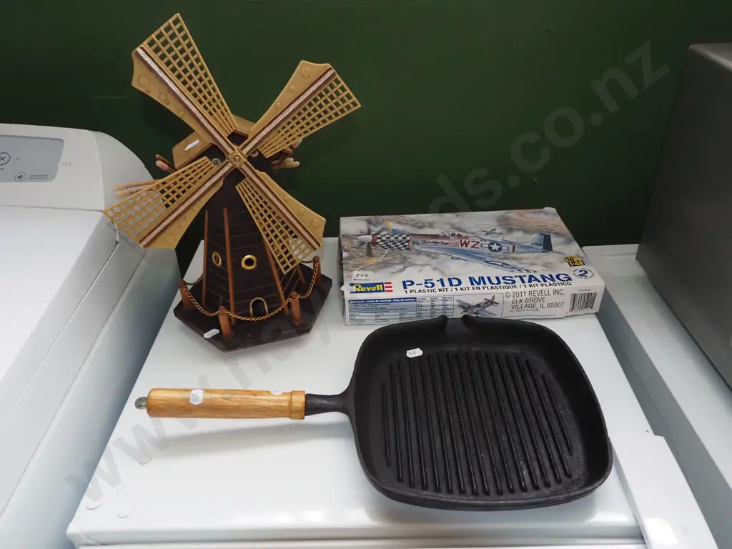 model windmill, cast iron skillet, yet to be assembled model of a Mustang plane Image 1++