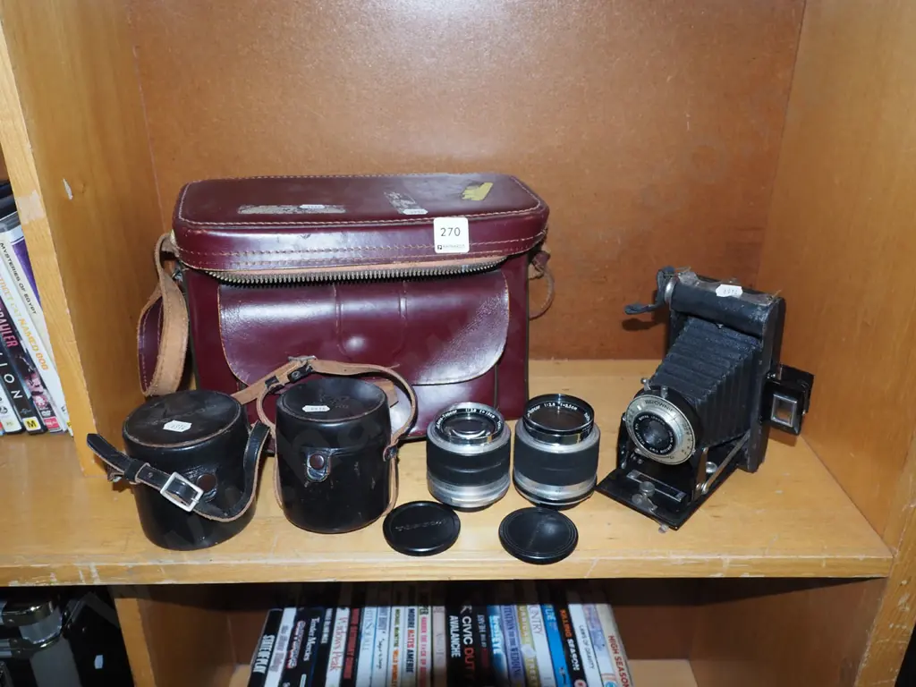 Kodak brownie folding camera, 2 Topcon bayonet mount lenses with cases, camera bag Image 1++