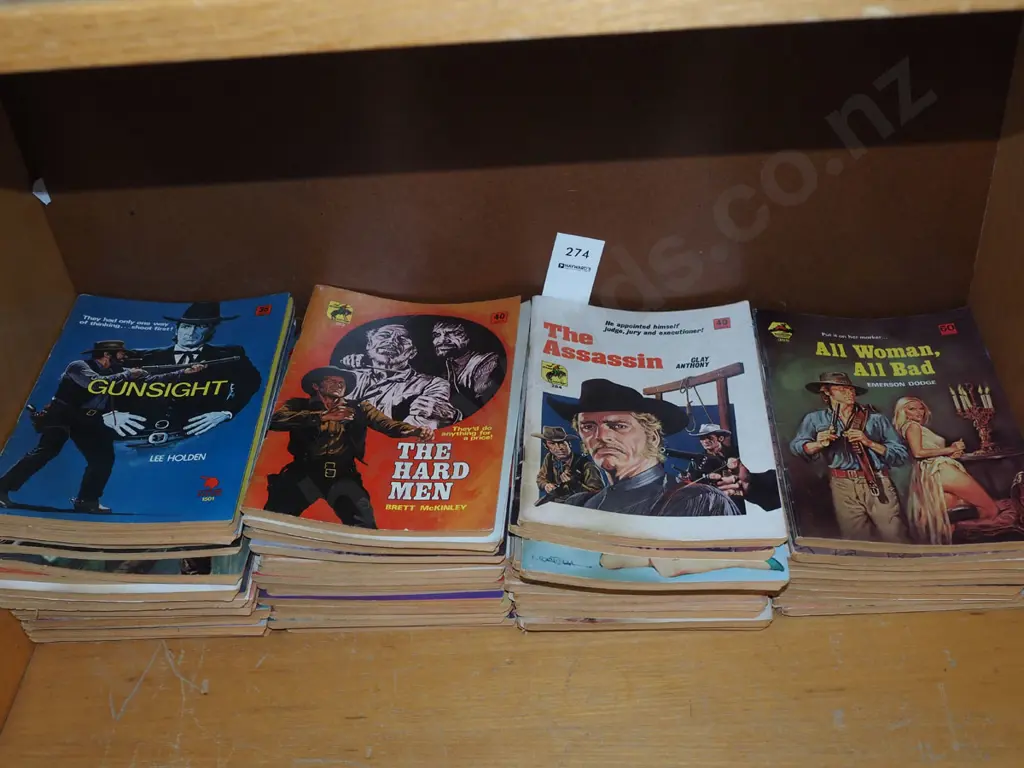 stack of paperback novels Image 1++