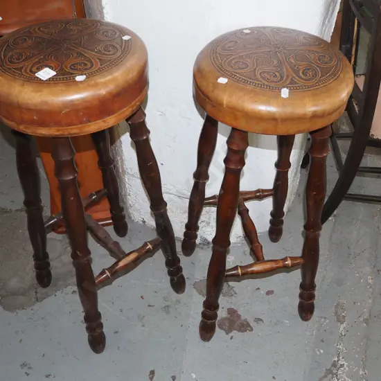 2x tooled leather stools