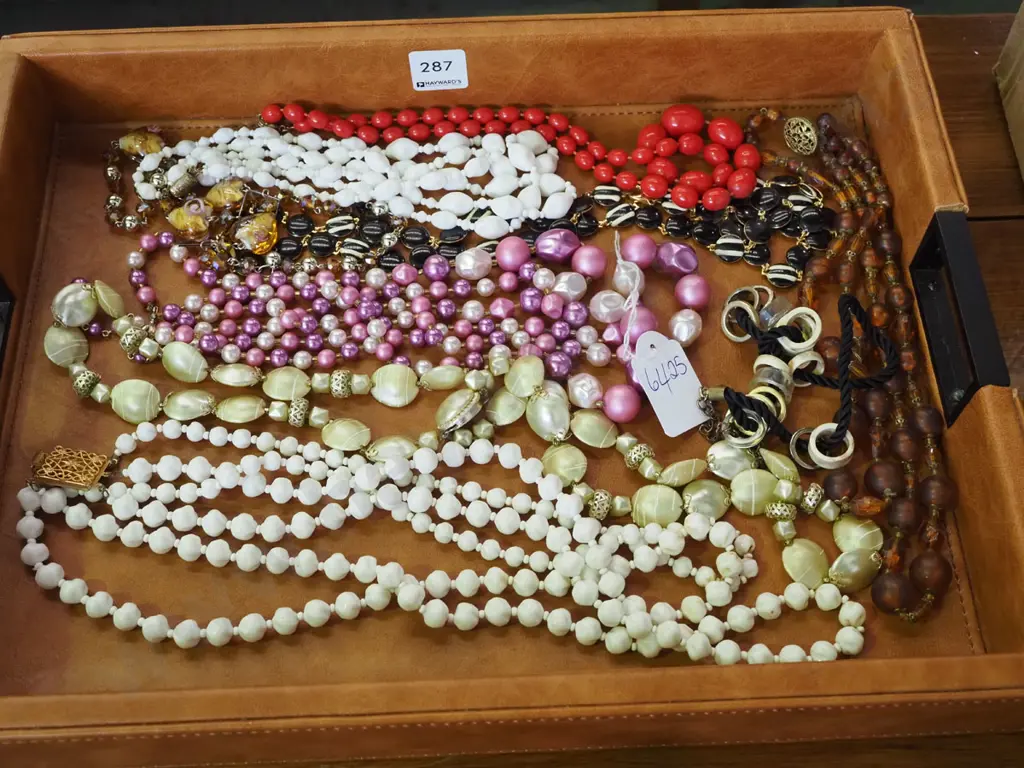 vinyl upholstered tray, costume necklaces Image 1++