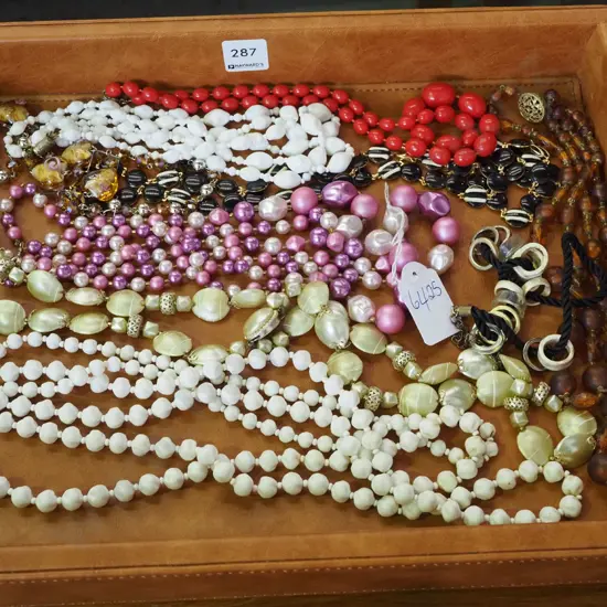 vinyl upholstered tray, costume necklaces