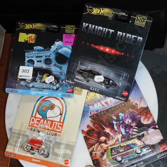 4x carded Hotwheels toy vehicles