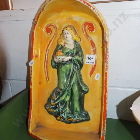 glazed terracotta figural wall mounted art work
