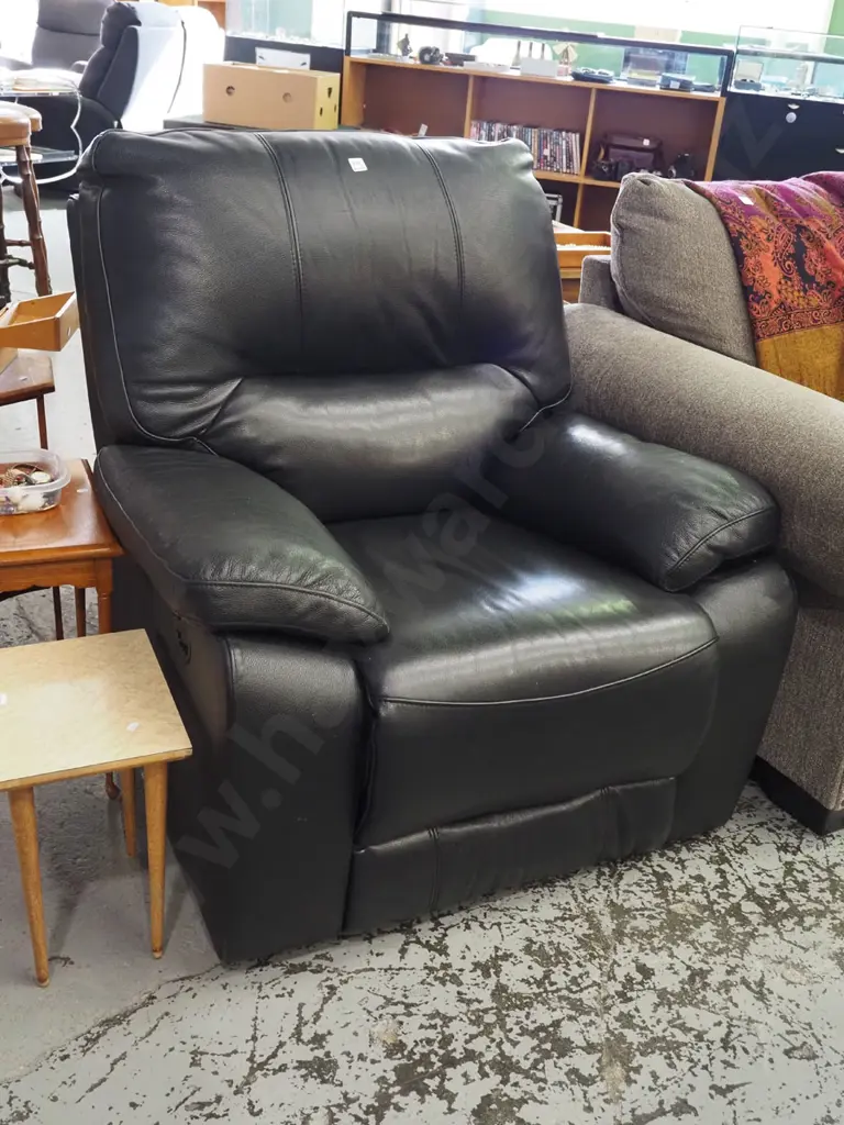 black leather upholstered reclining armchair Image 1++