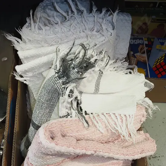 box; various woven floor mats