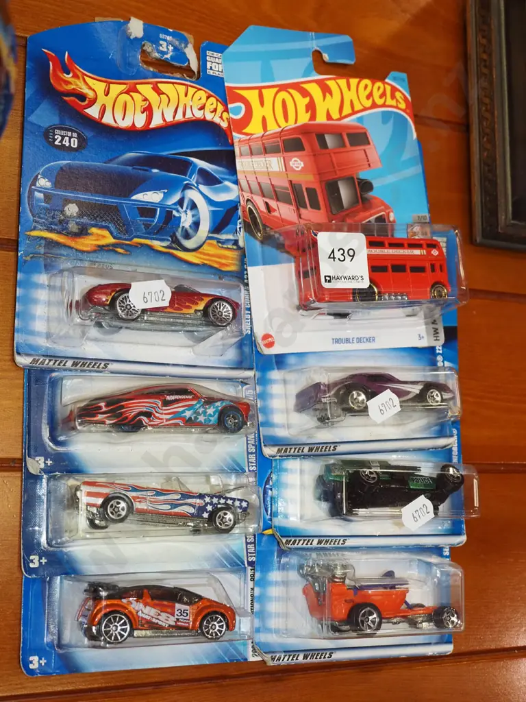 8x carded Hotwheels toy vehicles Image 1++