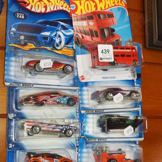 8x carded Hotwheels toy vehicles
