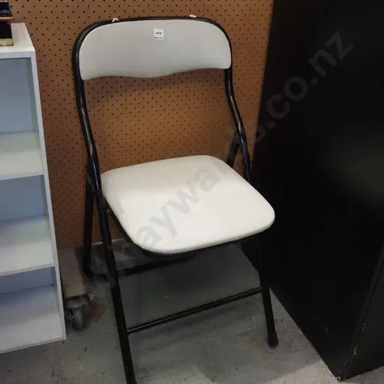 vinyl upholstered foldaway chair