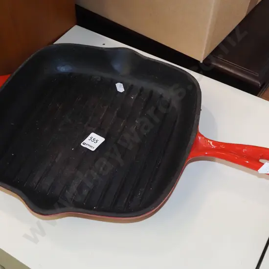 cast iron and enamel skillet