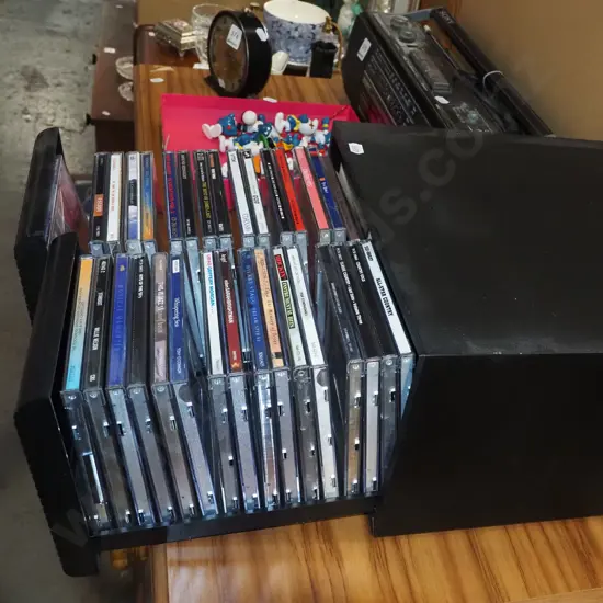 plastic twin drawer CD chest with CDs