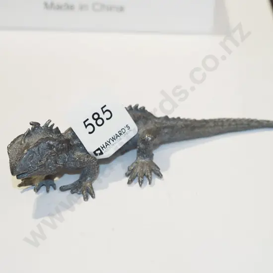 small metal lizard figurine