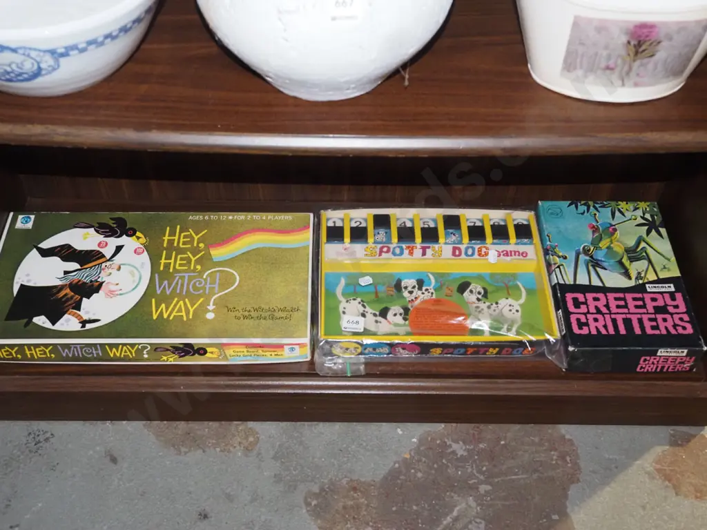 shelf; various board games Image 1++