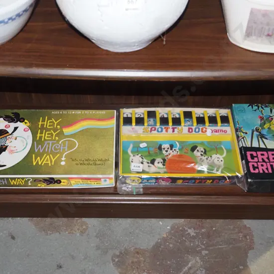 shelf; various board games