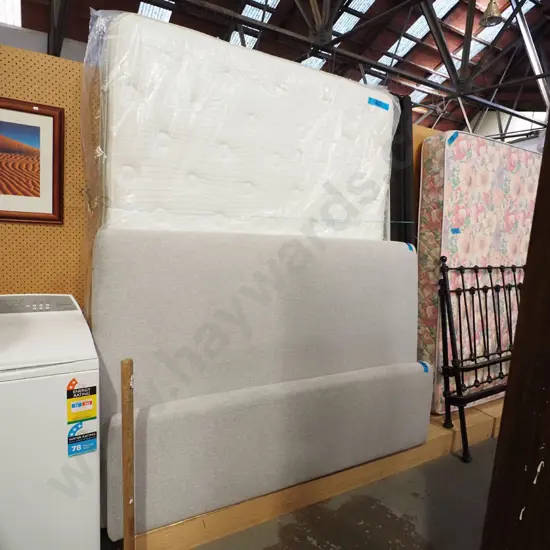 slat bed base, queen mattress and grey upholstered bedends