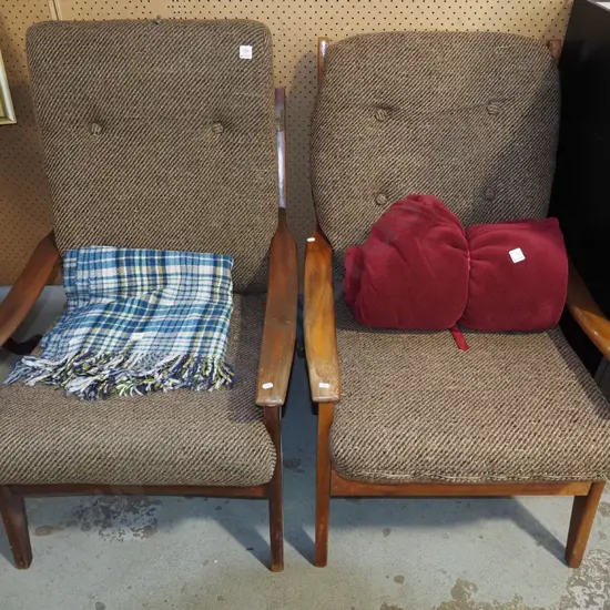 pair of mid century deep buttoned armchairs