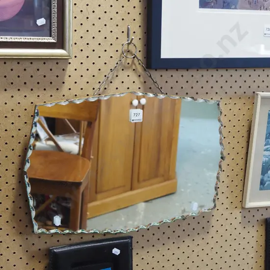 scalloped edged wall mirror
