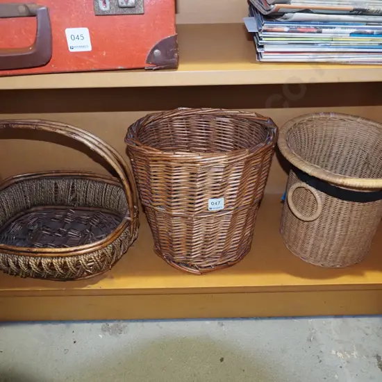 shelf of 3x cane baskets