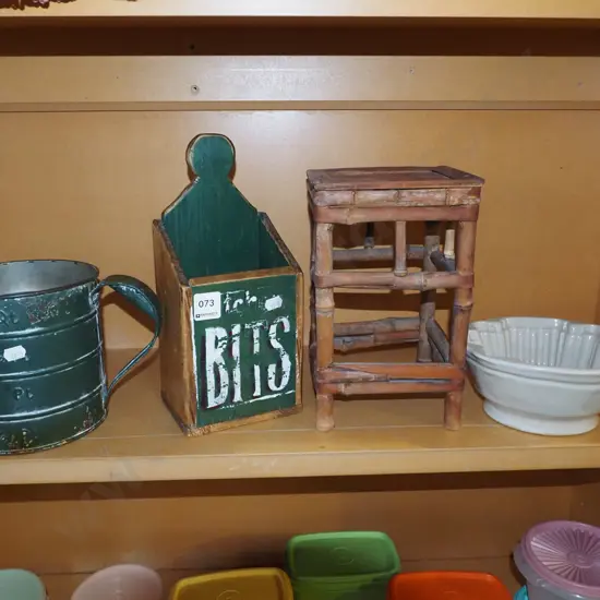 shelf; measuring jug, jelly mould, small bamboo stand, wooden utensil holder