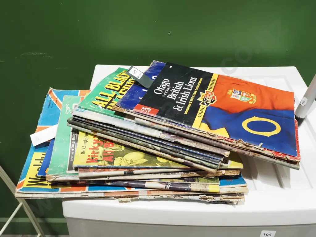 stack of assorted rugby programmes Image 1++
