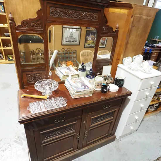 Edwardian mahogany mirror-back sideboard with carved panels in top w/ 3 arched beveled edge mirrors, 2 panelled doors