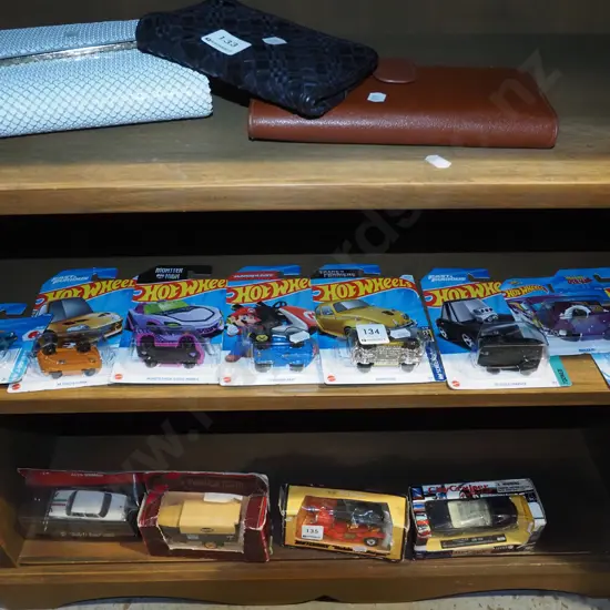 8x as new carded Hotwheels vehicles