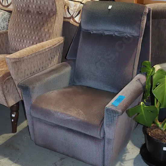 green and red 1980s LaZBoy rocker recliner