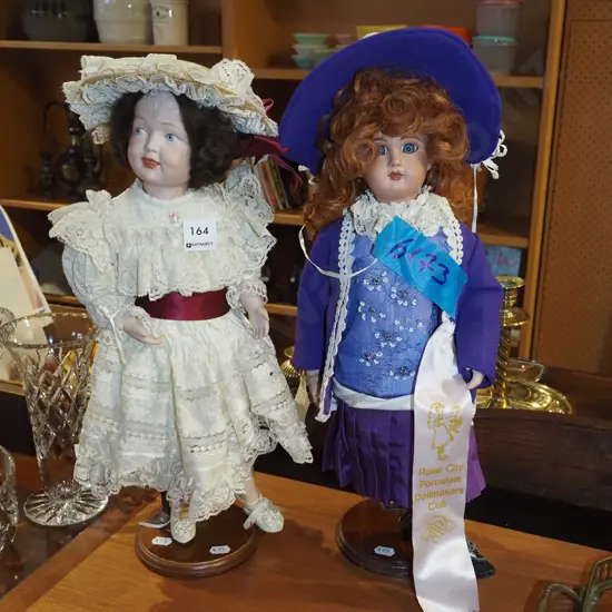 2x display dolls on stands