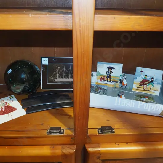 shelf; glass ball, souvenir prints on glass, tiles, ebonised wood 