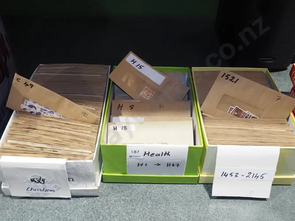 3x boxes of stamps Image 1++