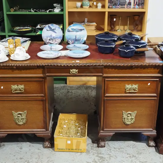 mahogany claw and ball footed 5 drawer desk with leather insert and pie crust edging H800 W1430 D700