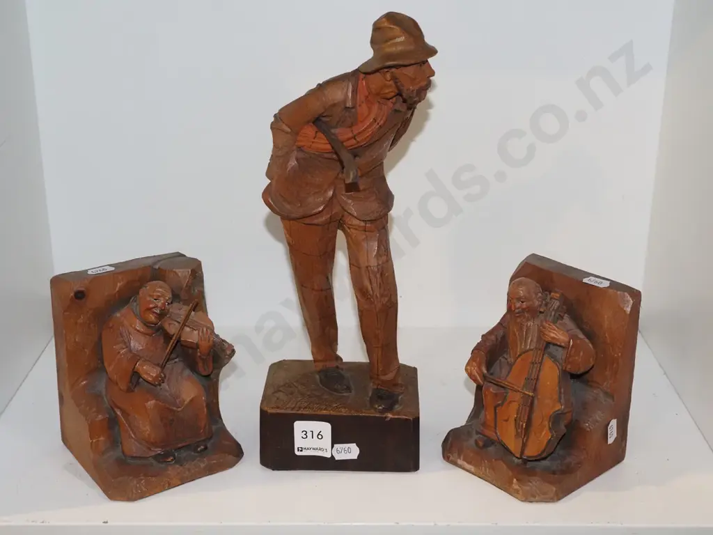 hand carved European figurine, carved bookends Image 1++