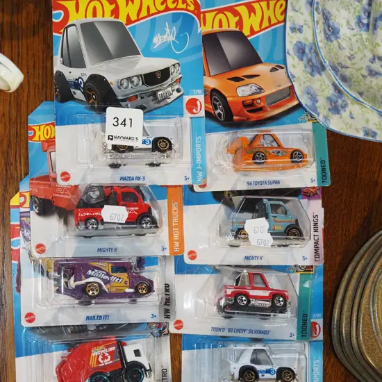8x as new carded Hotwheels vehicles