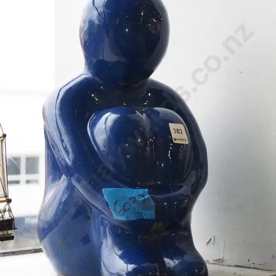 blue ceramic figurine - person sitting H350