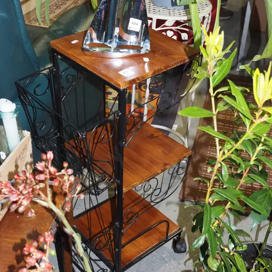 metal and wood shelves on casters with magazine rack H670