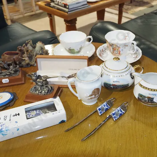 cups, saucers, teaspoons, soapstone figurines etc