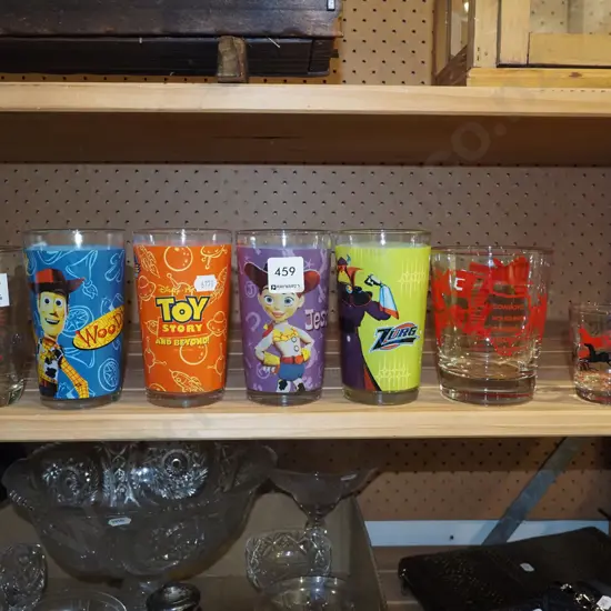 shelf of promotional glass tumblers