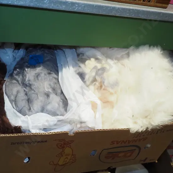 box of unspun sheep wool
