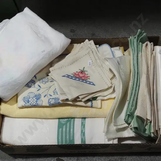 box; hand worked linen, tablecloths etc