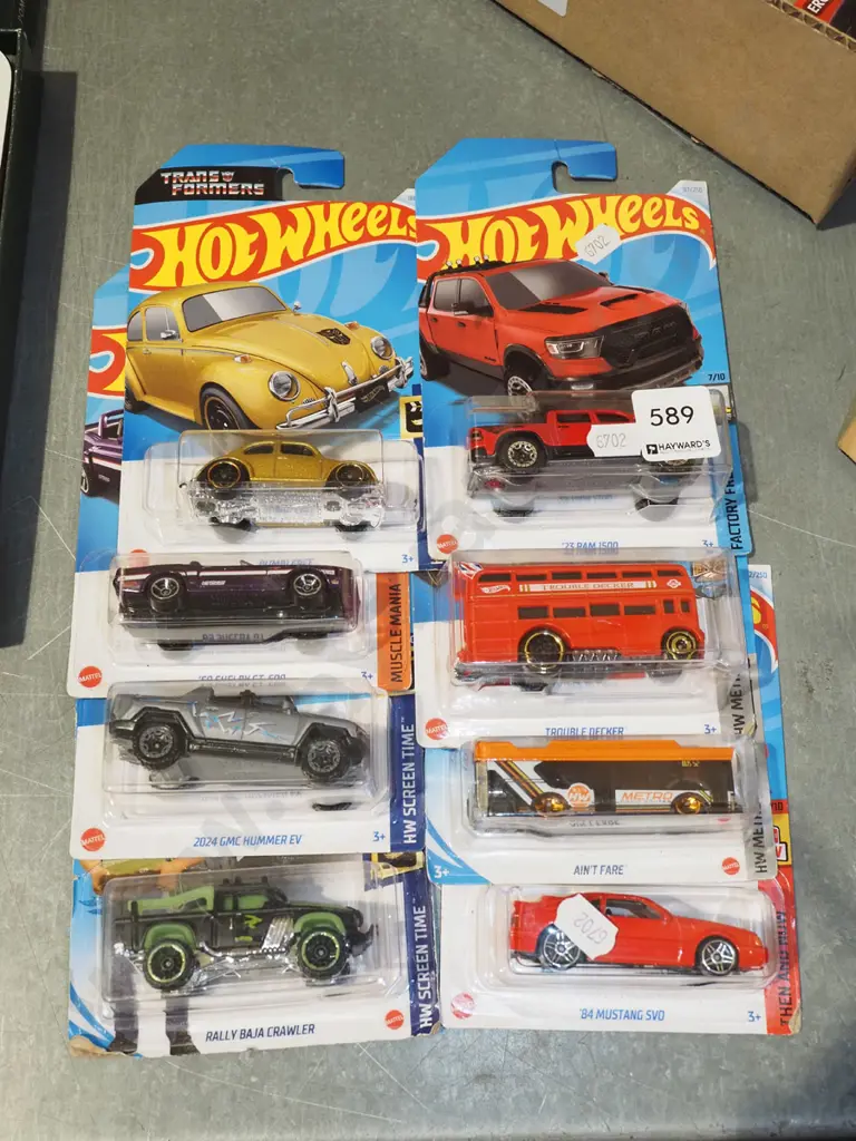 8x as new carded Hotwheels vehicles Image 1++